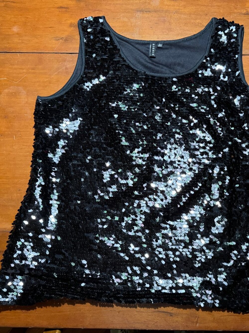 Dressy black sequin sleeveless top = party time!